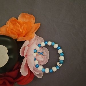 NWOT Blue Ribbon Memory Wired Bracelet